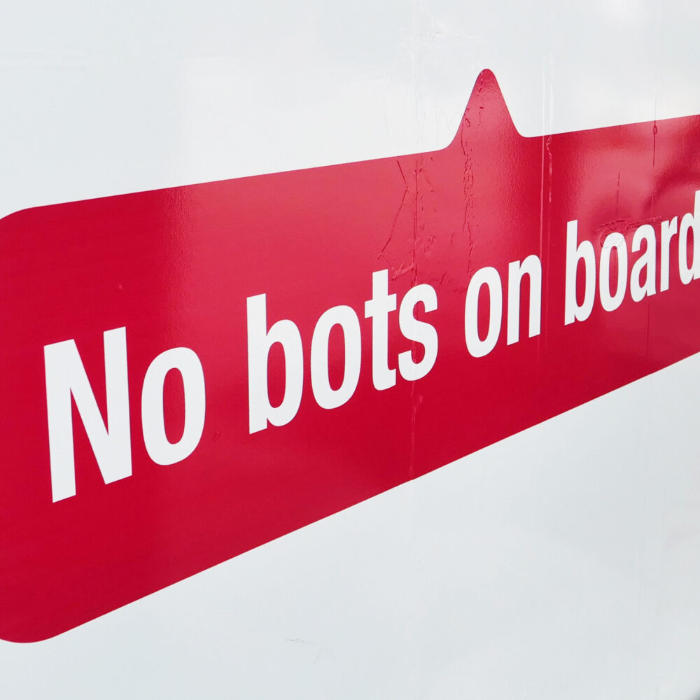 Close up of design with "No bots on board"