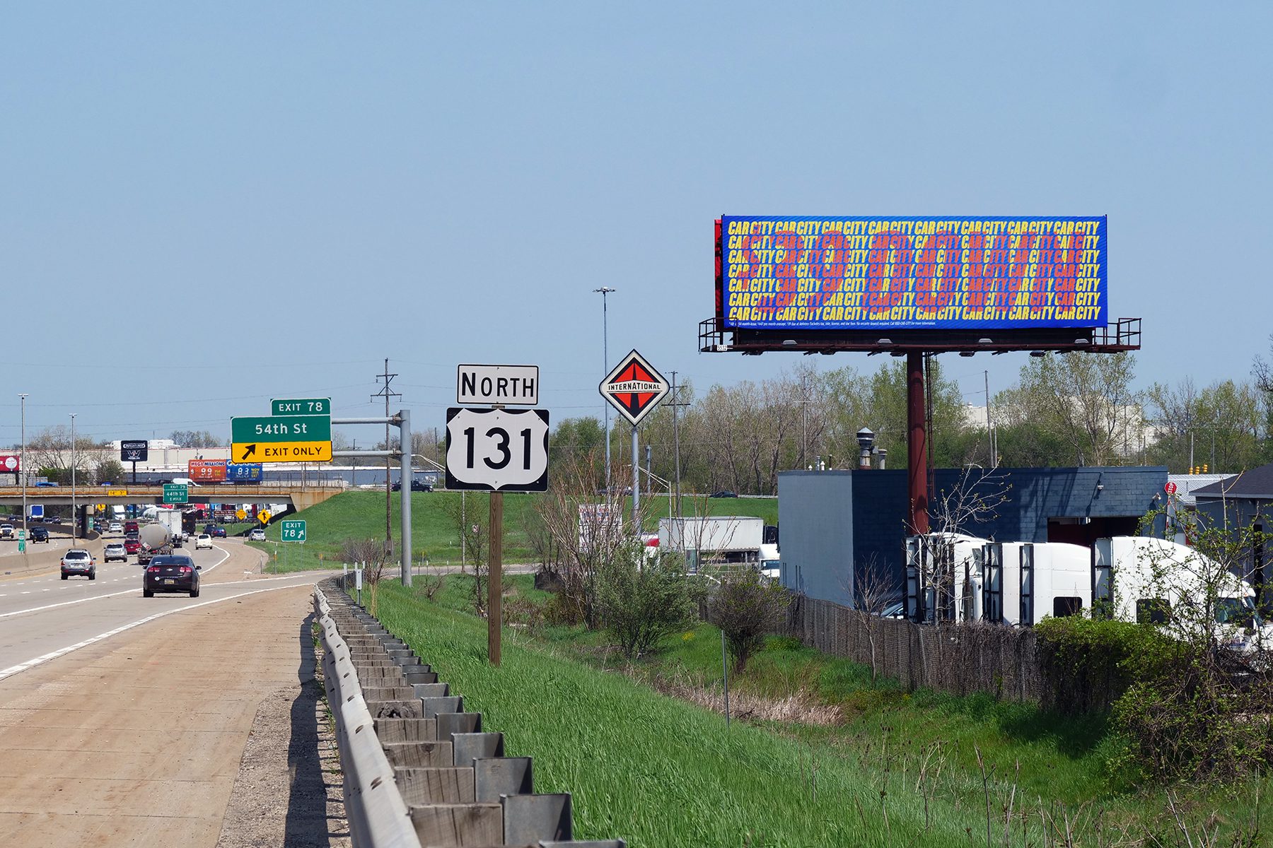 Car City 'Approach' bulletin that reads $39 down from a distance but CarCity numerous times once you approach it.