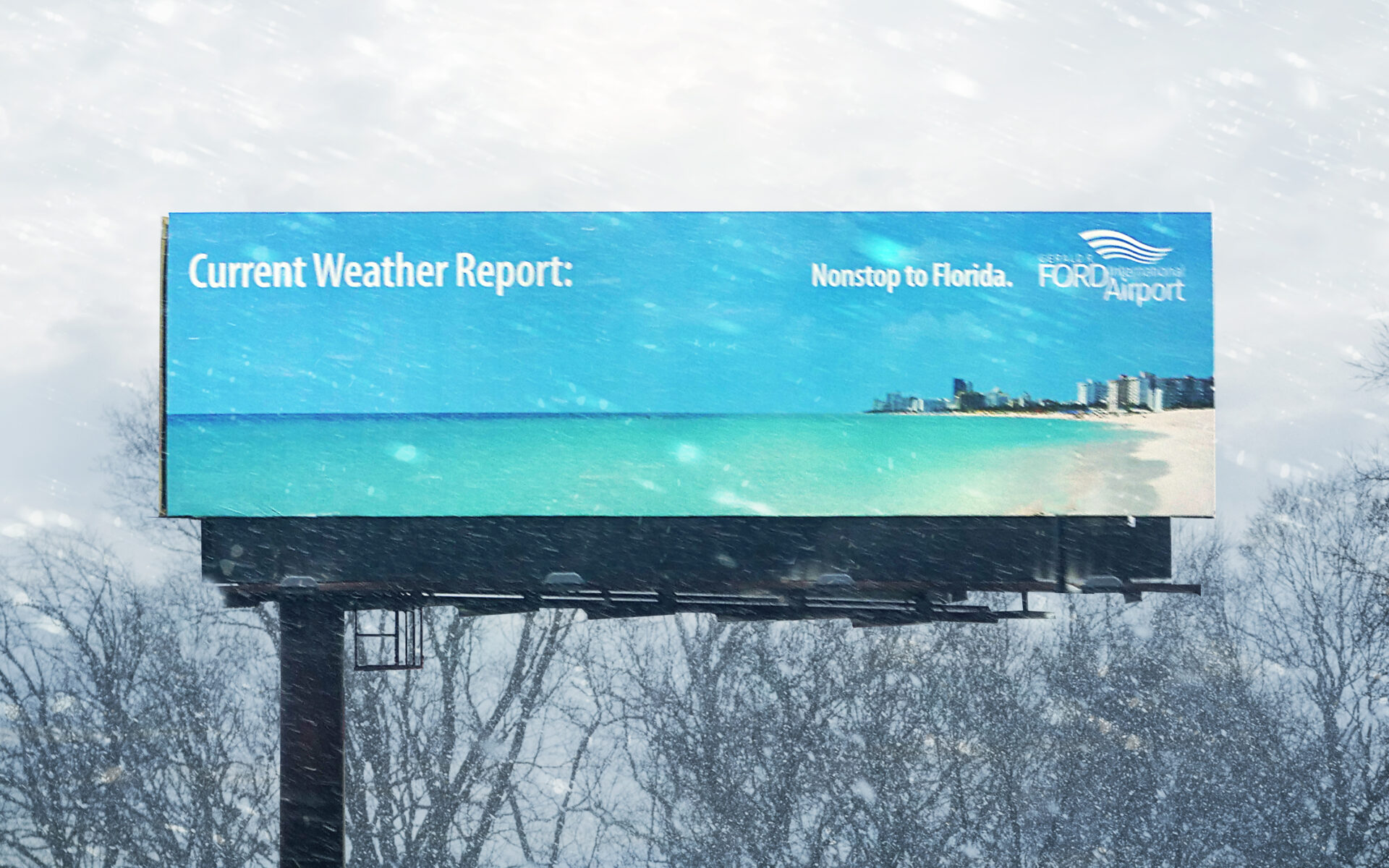 Winter photo of an out of home bulletin showing the Florida beach with headline "Current weather report:"