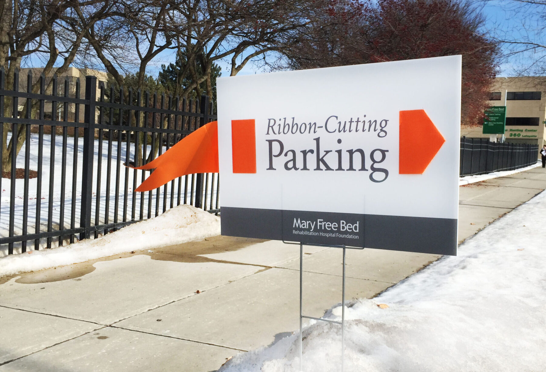 Ribbon-cutting event parking yard sign