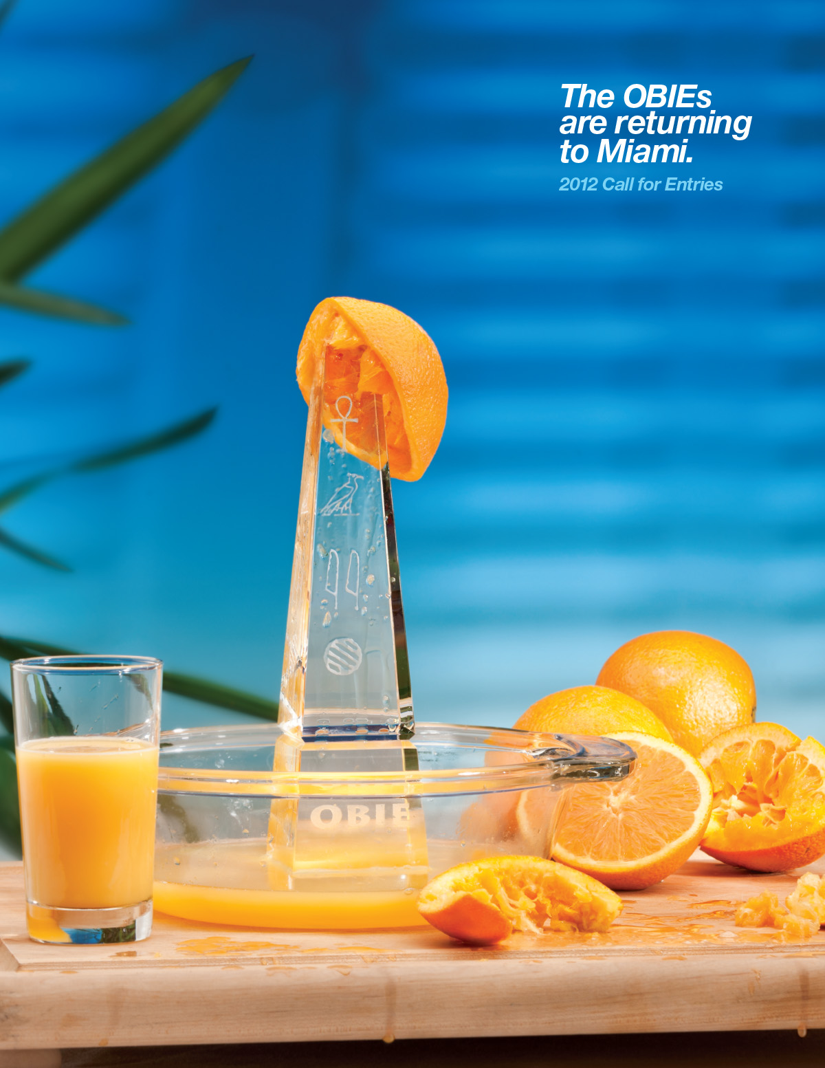 Print advertisement with OBIE award as orange juicer and headline "The OBIEs are returning to Miami"