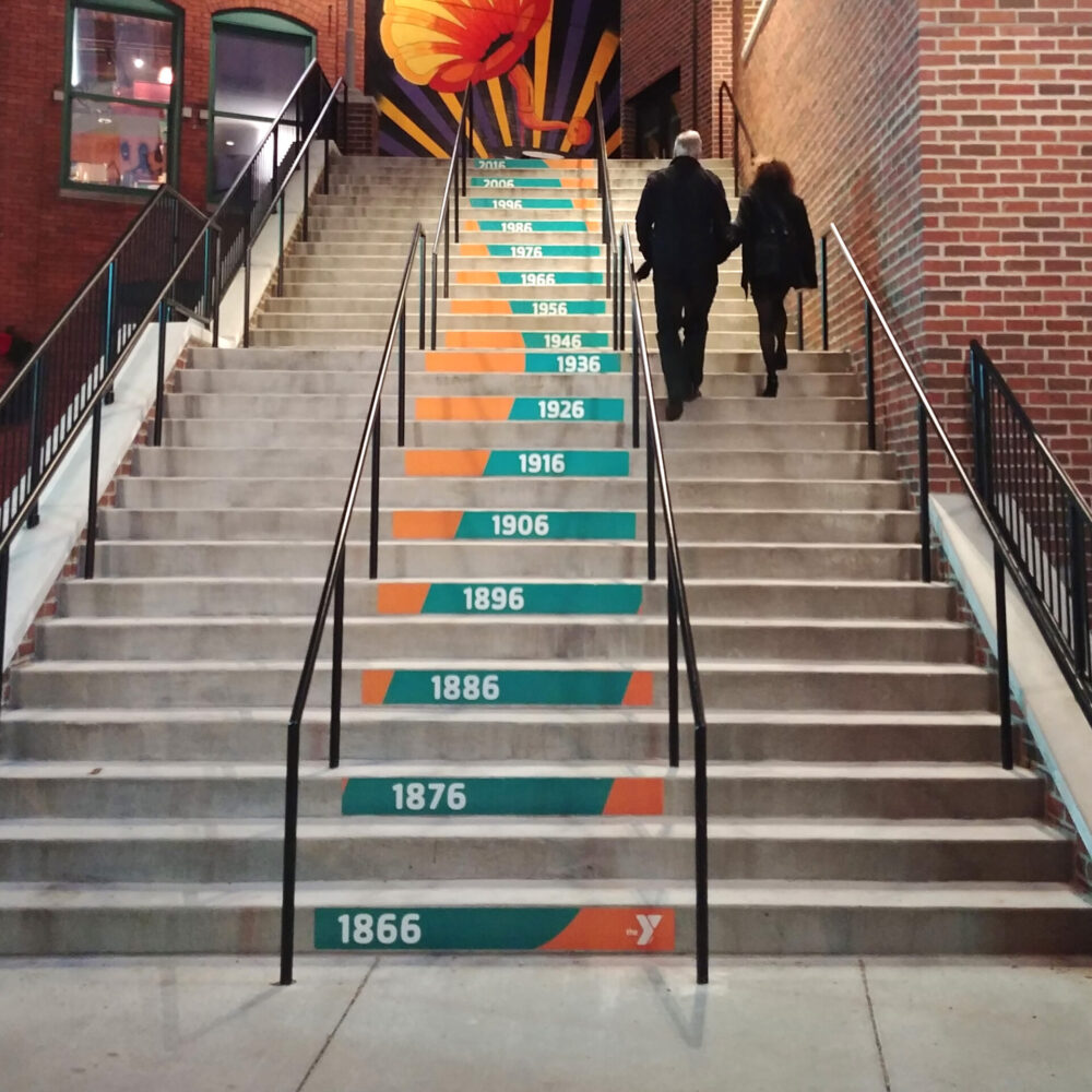 Decals of a timeline applied to stairs.