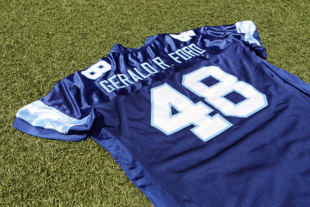 Jersey shirt designed for Gerald R. Ford International Airport with the number 48 and the name Gerald R. Ford on the back.