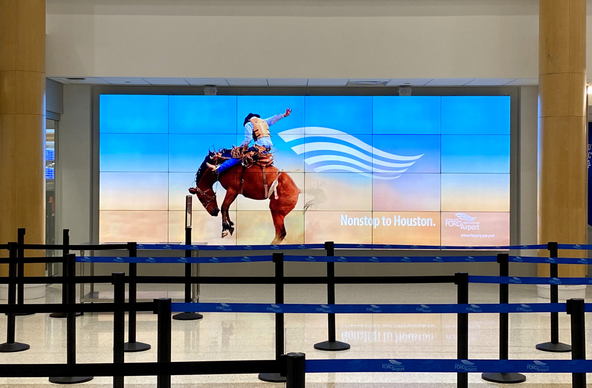 Digital out of home for Gerald R. Ford International Airport. Nonstop to Houston